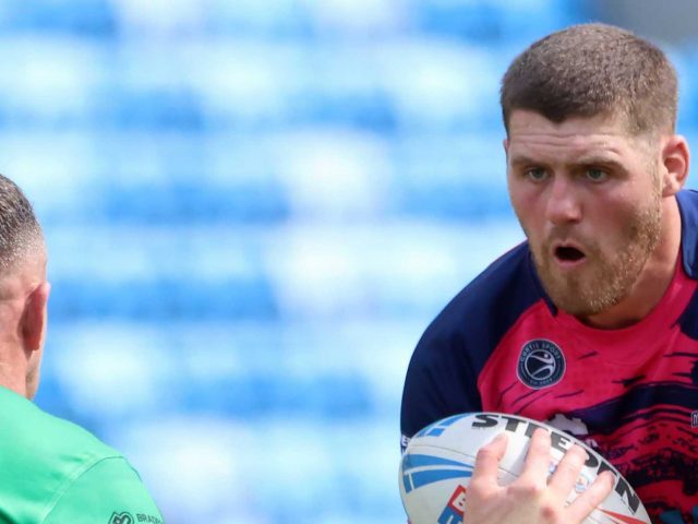 WOOD COMMITS FOR TWO MORE YEARS